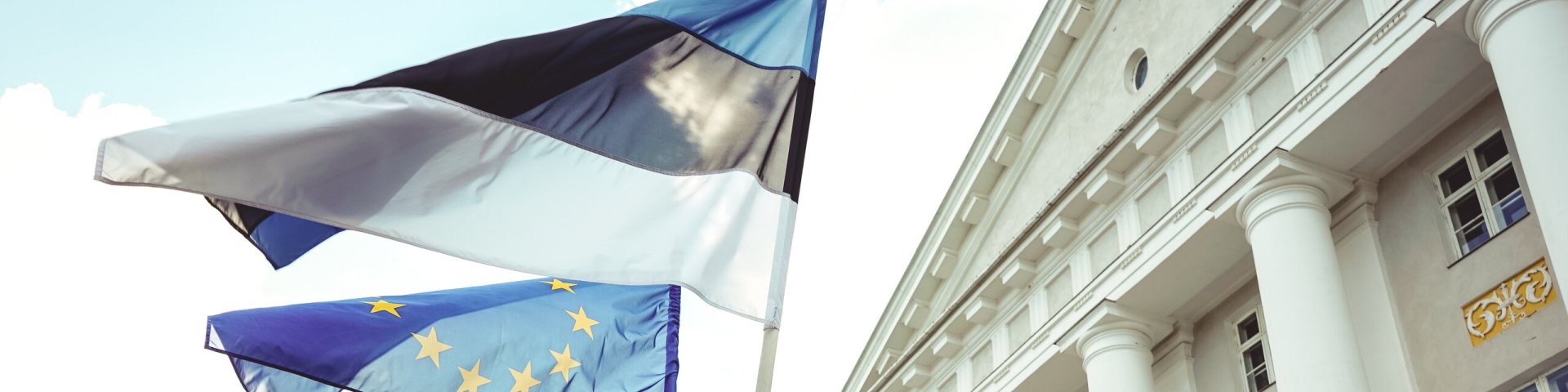 main building with flags